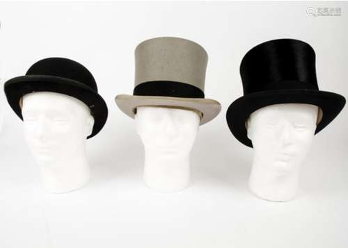 Three vintage Gentleman's hats in boxes, consisting of two top hats and one bowler (3)