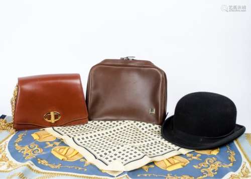 A selection of Dunhill bags, including four toiletry bags, one in the original slip bag and two