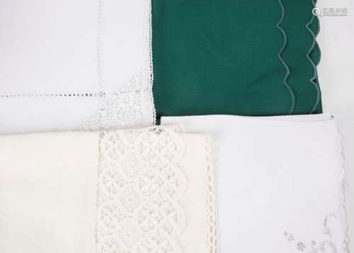 A large selection of 20th Century linen and fabric, including tablecloths, doilies, placemats and