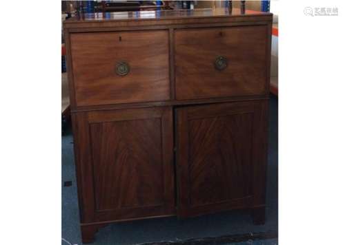 A Regency mahogany buffet, with two cellarette drawers above flame mahogany panel doors, possibly