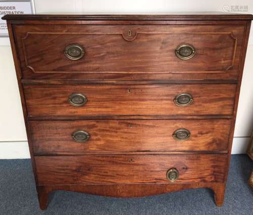 A mid 19th Century mahogany secretaire chest of drawers, three graduated drawers below fitted bureau