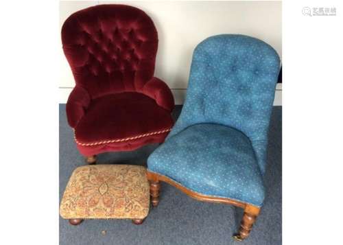 Two 19th Century button back walnut nursing chairs, upholstered in burgundy and blue with gold dots,