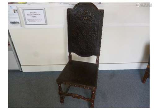 A 19th Century Portuguese oak hall chair, with an embossed leather seat and back cover, brass