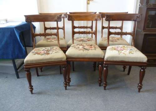 A set of six Rosewood Bar Back dining chairs, with carved foliate back splats, with tapestry drop in