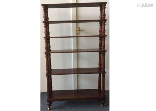 A 19th Century mahogany six-tier what not, comprising of six graduated shelves with turned supports,