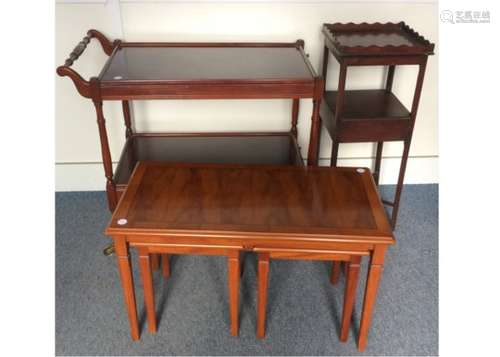 A contemporary mahogany two-tiered trolley with inlay, a slide to top and a drawer to under tier,