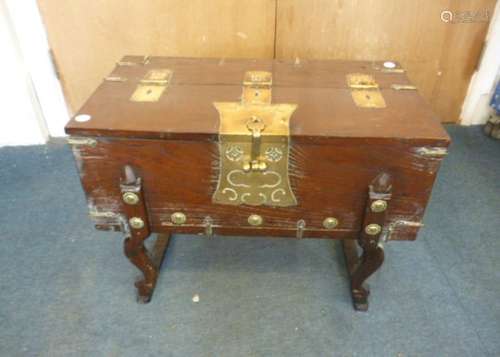 A 19th Century Chinese elm and brass bound small box on stand, the top divided in half and rising