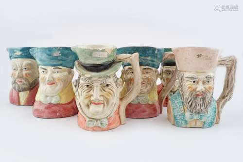 SET OF SEVEN POLYCHROME CHARACTER JUGS