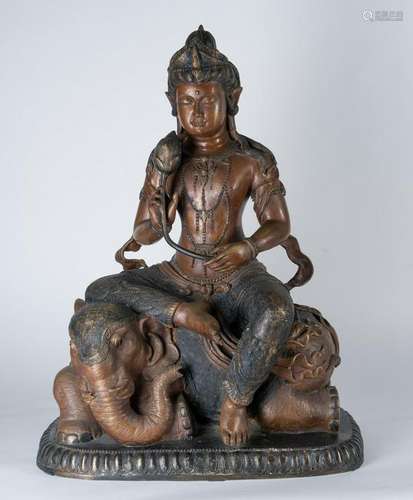 Arte Himalayana  A partialli painted bronze figure of