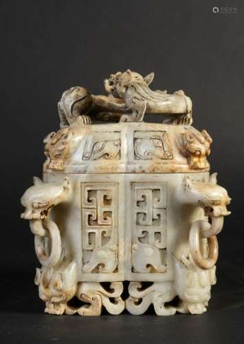 Arte Cinese  A white jade and russet container carved