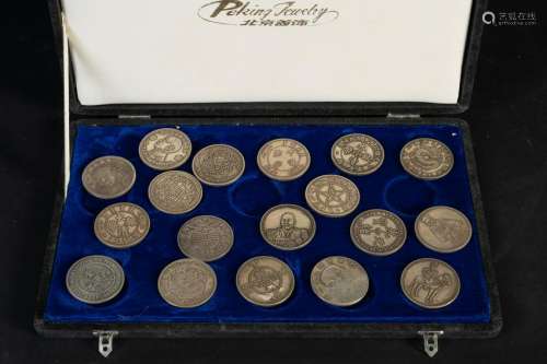 Arte Cinese  A collection of 18 silver coinsChina, Qing