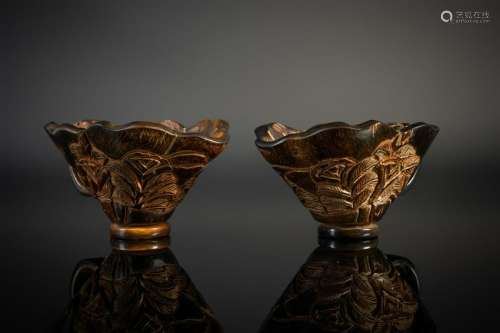 Arte Cinese  A pair of rhino horn libation cups carved