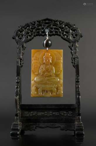 Arte Cinese  A celadon jade plaque carved with Buddha