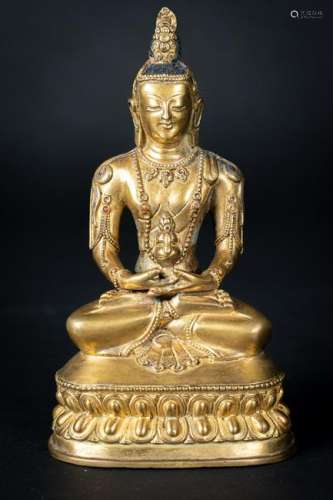 Arte Himalayana  A gilt bronze figure of Amitayus