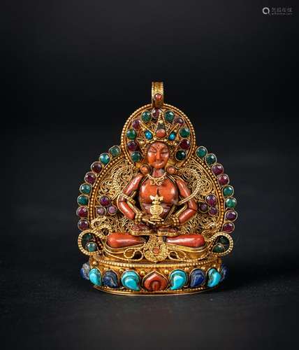 Arte Himalayana  A pendant decorated with a coral