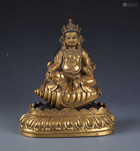 A Chinese Carved Gilt Bronze Figure of Jambhala