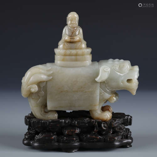 A Chinese Carved White Jade Luohan and Zitan Wood Stand
