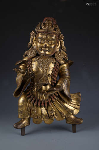 A Chinese Carved Gilt Bronze Figure of Guardians