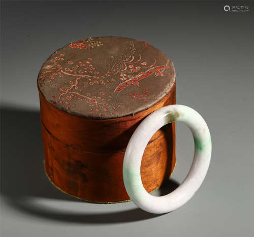 A Rare Chinese Jadeite Green Ground Round Bangle