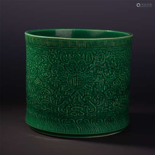 A Chinese Celadon-glazed Porcelain Brush Holder Carved with Floral Motif