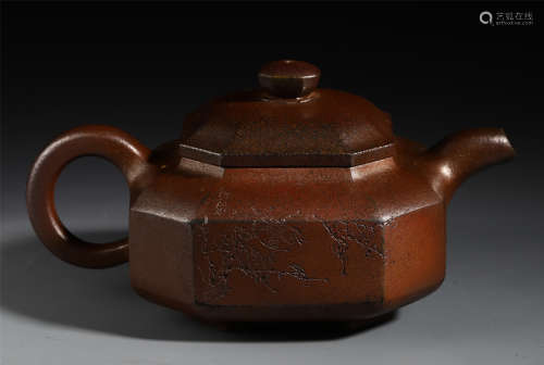 A Chinese Inscribed Zisha Teapot with Floral Motif