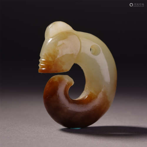 An Archaic Jade Carved Dragon