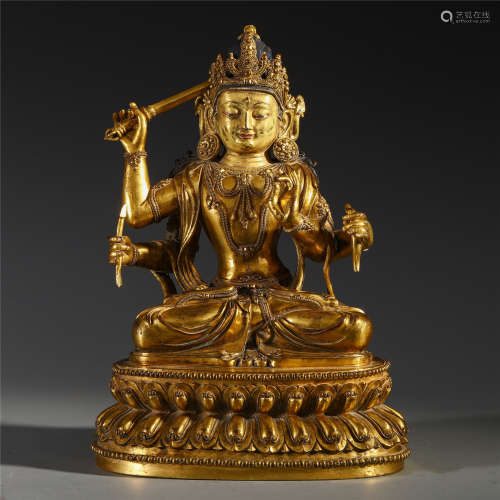 A Chinese Gilt Bronze Four-armed Bodhisattva Manjusri