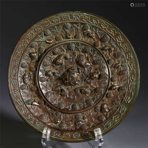 A Chinese Bronze Mirror with Beast Pattern