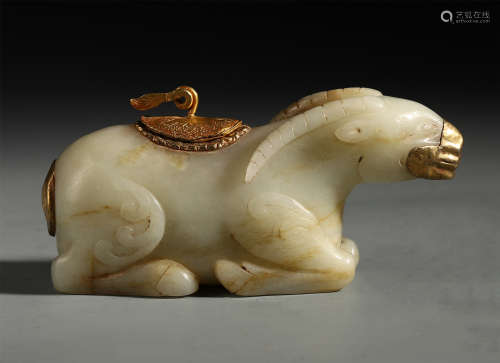 A Finely Chinese Gold-decorated Beast Carving