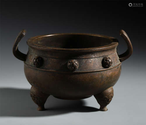 A Chinese Bronze Tripod Censer