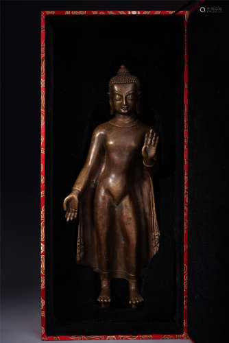 A Chinese Nepal-style Bronze Figure of Standing Buddha