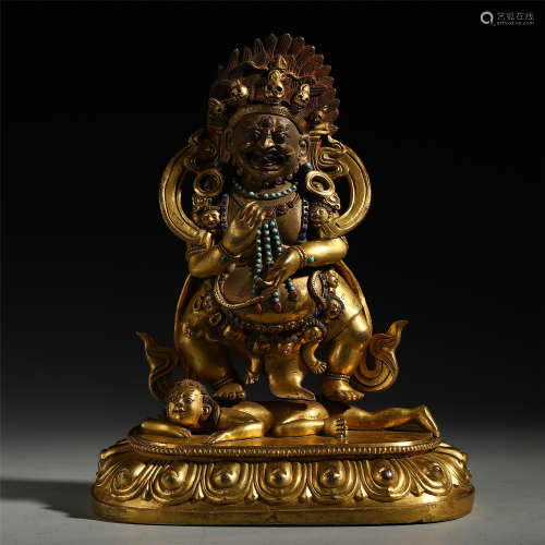 A Chinese Gilt Bronze Carved Figure of Standing Mahakala