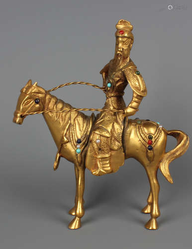 A Chinese Carved Gilt Bronze Statue