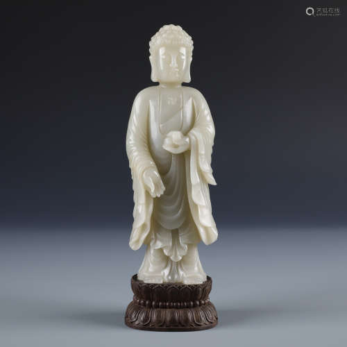 A Chinese Carved Celadon Jade  Figure of Sakyamuni