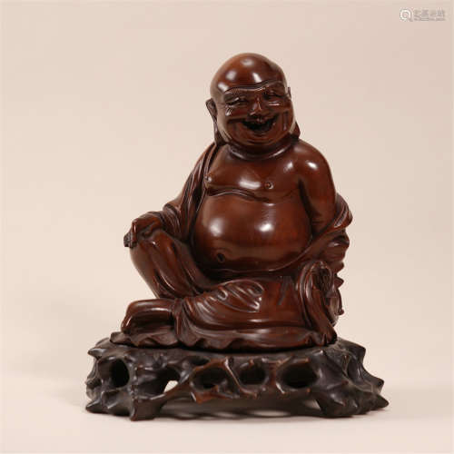 A Chinese Huangyang Wood Carved Figure of Seated Buddha Maitreya