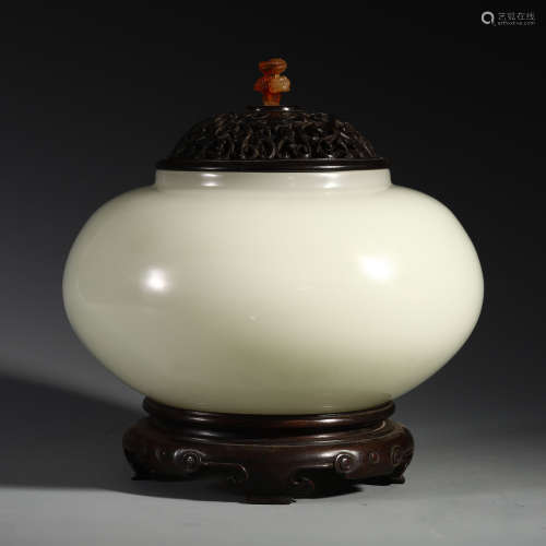 A Chinese White Glass Jar (with Wooden Cover and Base)