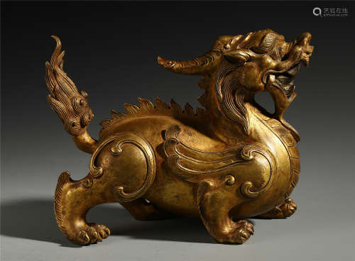 A Chinese Gilt Bronze Carving of Beast