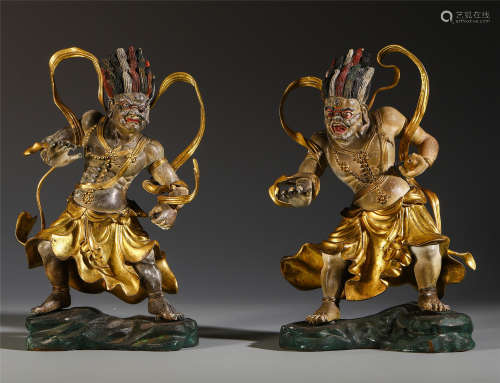 A Chinese Gilt Bronze Figure of the Marshals Heng and Ha