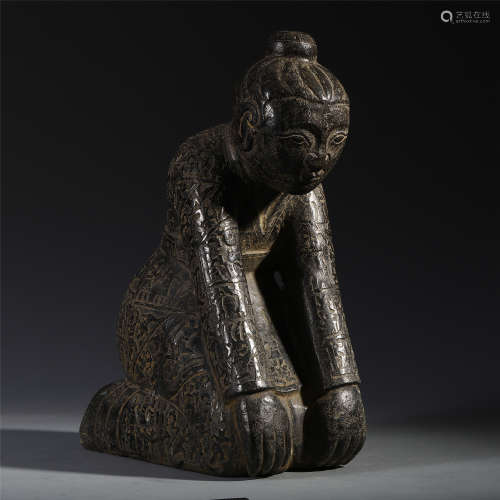 A Chinese Jade Carved Kneeling Figure