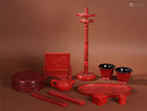 An Exquisite Cinnabar Lacquer Study Set with Lotus Flower, Ruyi and Floral Motif