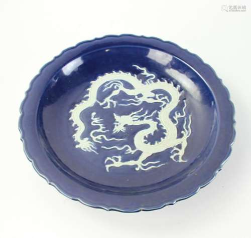 Large Chinese Charger with Carved Dragon