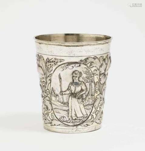 A cupGerman, late 17th century Silver. Hammered, chased and embossed decor. Ligated mark M.K. Height