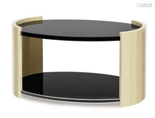 An Art Deco coffee tableFrance, circa 1930 Wood, lacquered. Metal straps. Restored. 50 x 95 x 59