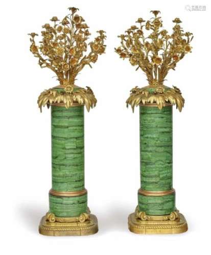 A pair of large 13-light candlesticksProbably France, mid-19th century Bronze, gilt, as well as