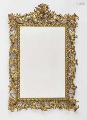 A mirrorItalian Baroque style Hardwood, painted in gold. Restored, minor damage. 157 x 110 cm.