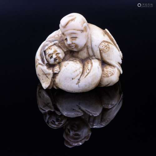 A Carved Ivory Netsuke of a Pair of Noh Players, E…
