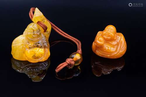 Two Carved Natural Amber Items