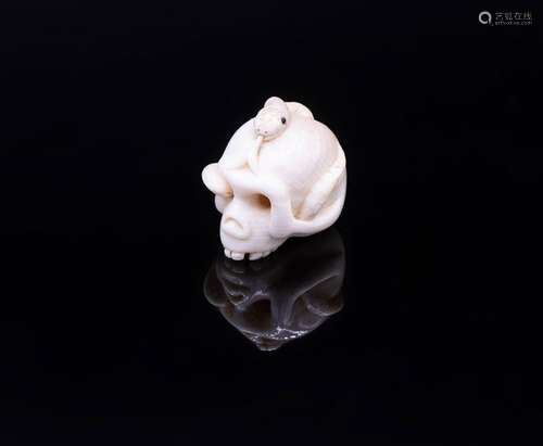 A Fine Small Carved Ivory Netsuke of a Scull with …