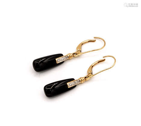 A Pair of Gold Diamond and Onyx Earrings