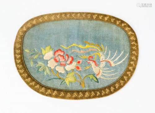 A 19th century silk purse, embroidered to depict a pheonix (Reng-Huang), 12 by 16½cm.